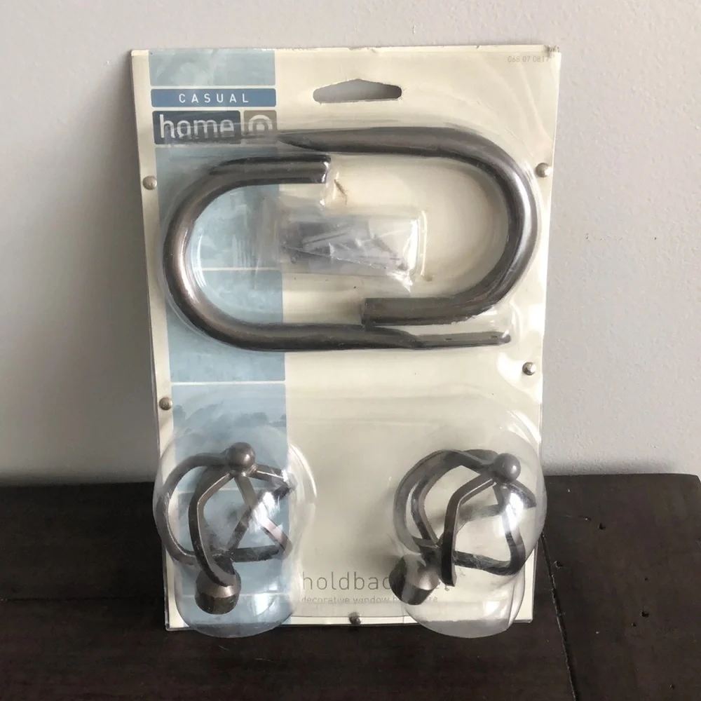 Decorative window hardware holdback set